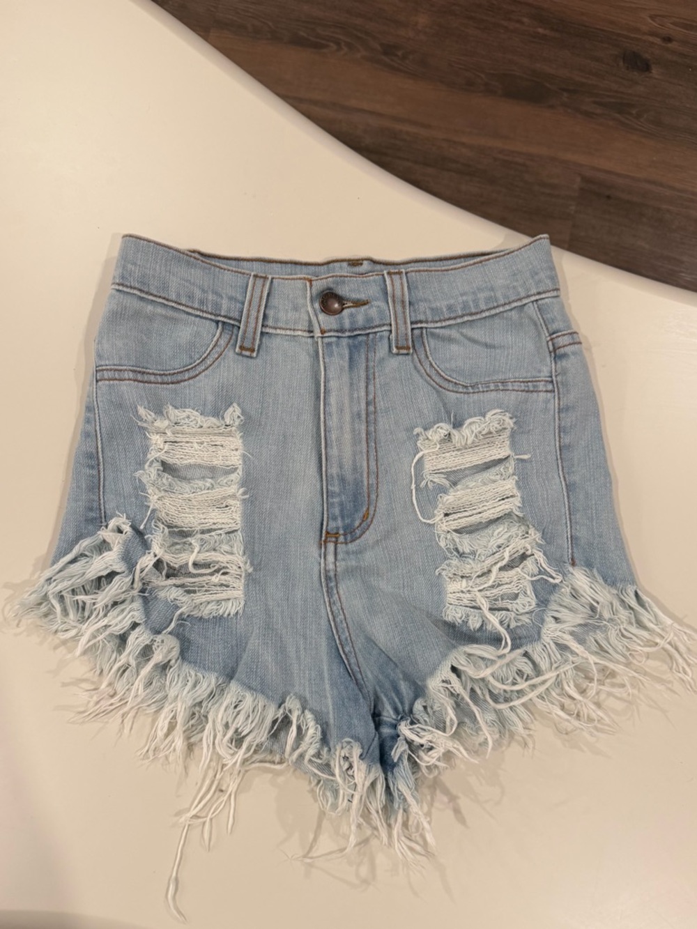 Distressed Light Blue Denim Jean Shorts with Frayed Hem